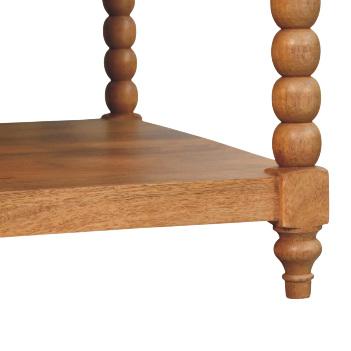 Close view of the turned legs on the Langham Square Coffee Table in Almond.