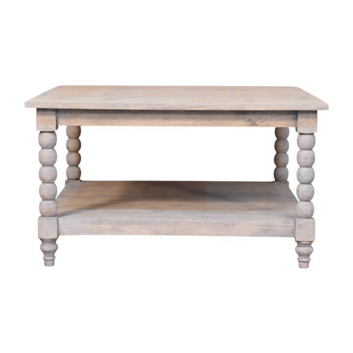 Langham Square Coffee Table in Salt, front view. Solid hardwood throughout, washed salt finish with a light coastal cast, carved spindle legs.