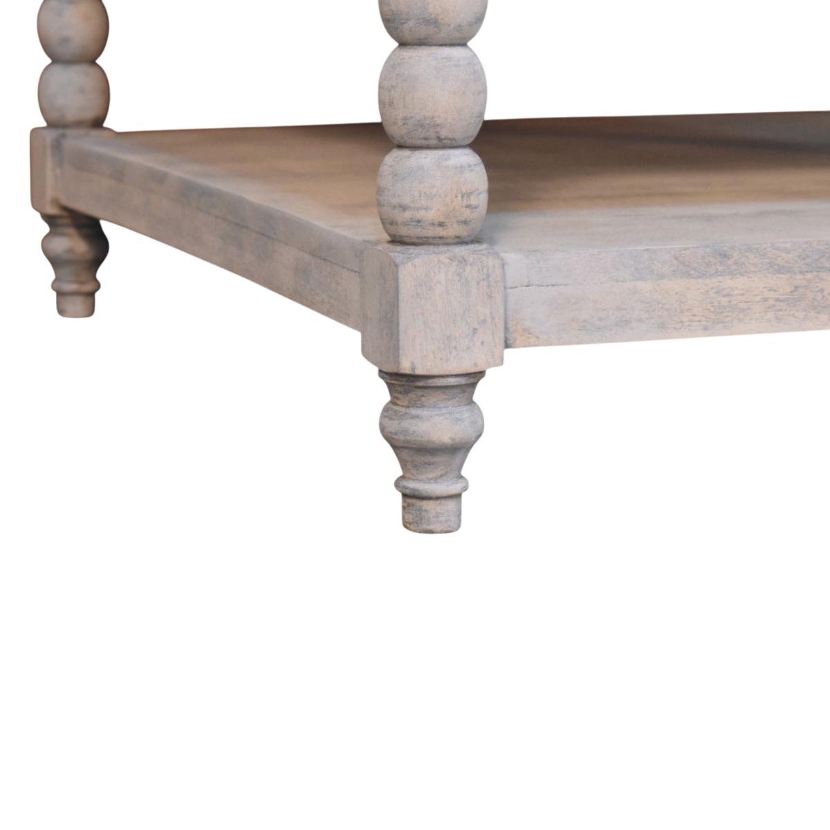 Close view of the bobbin turning on the Langham Square Coffee Table in Salt.