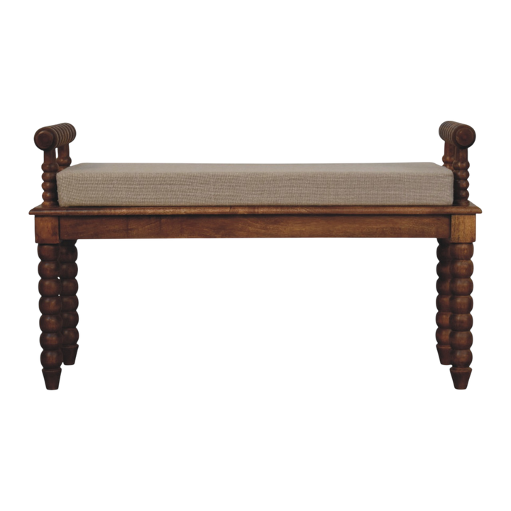 Langham Window Bench in Amber with Clay Linen, front view. Amber oak with carved spindle legs and a clay linen seat.