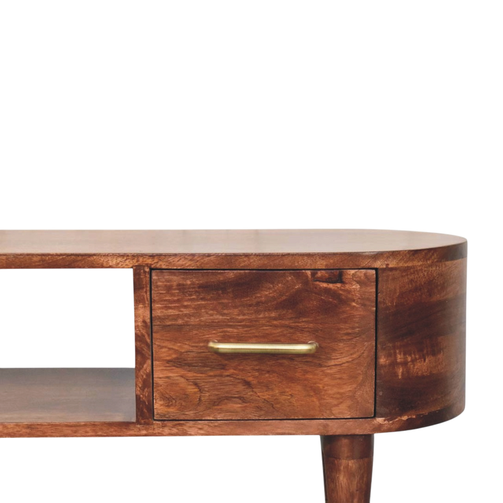 Close view of the brass hardware on the Lansdowne Curved Media Unit in Almond.