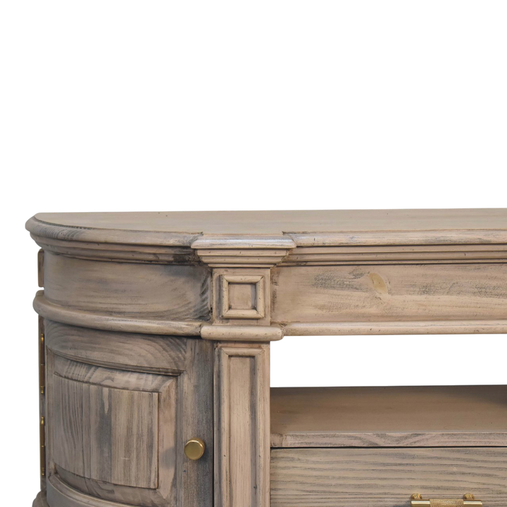 Close view of the hand-carved frame on the Lansdowne Media Unit in Driftwood.