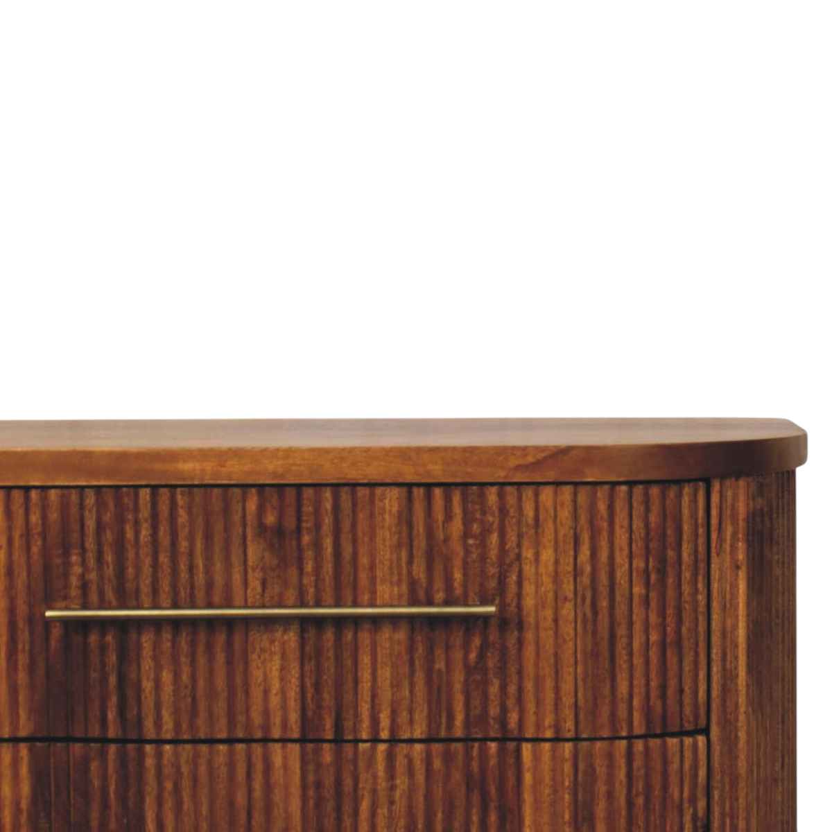 Close view of the brass hardware on the Lansdowne Ribbed 3-Drawer Chest in Amber.