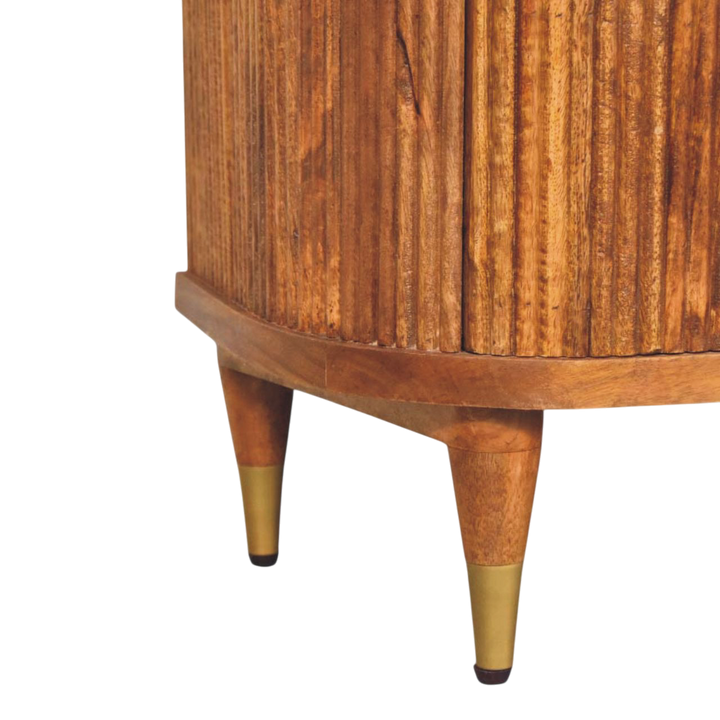 Close view of the legs on the Lansdowne Ribbed 3-Drawer Chest in Amber.