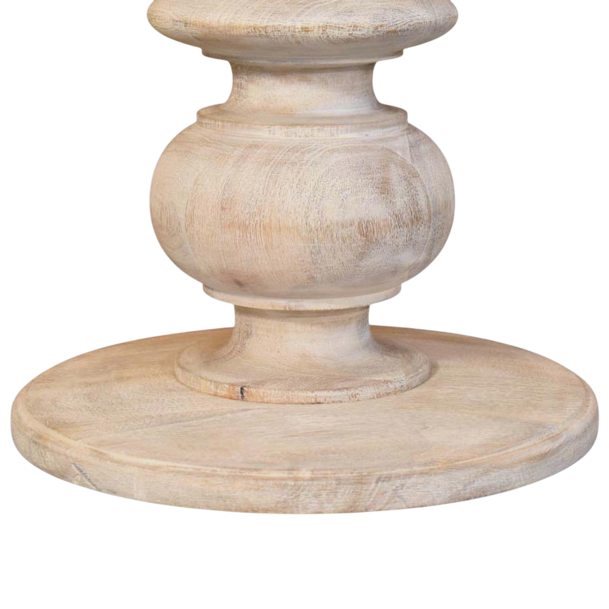 Close view of the sculpted base on the Lucca Table in Salt.
