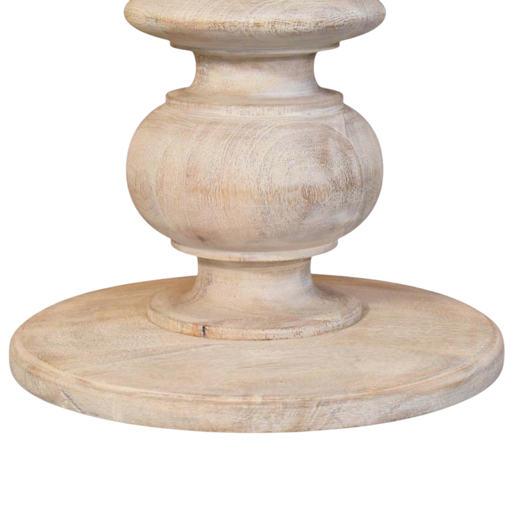 Close view of the sculpted base on the Lucca Table in Salt.