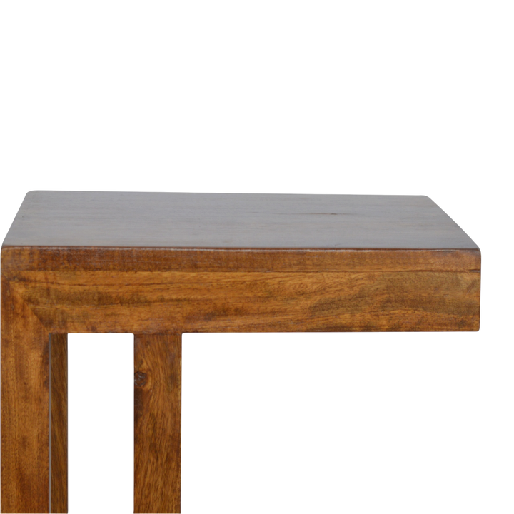 Close view of the edge on the Marlow One-Sided End Table in Chestnut.