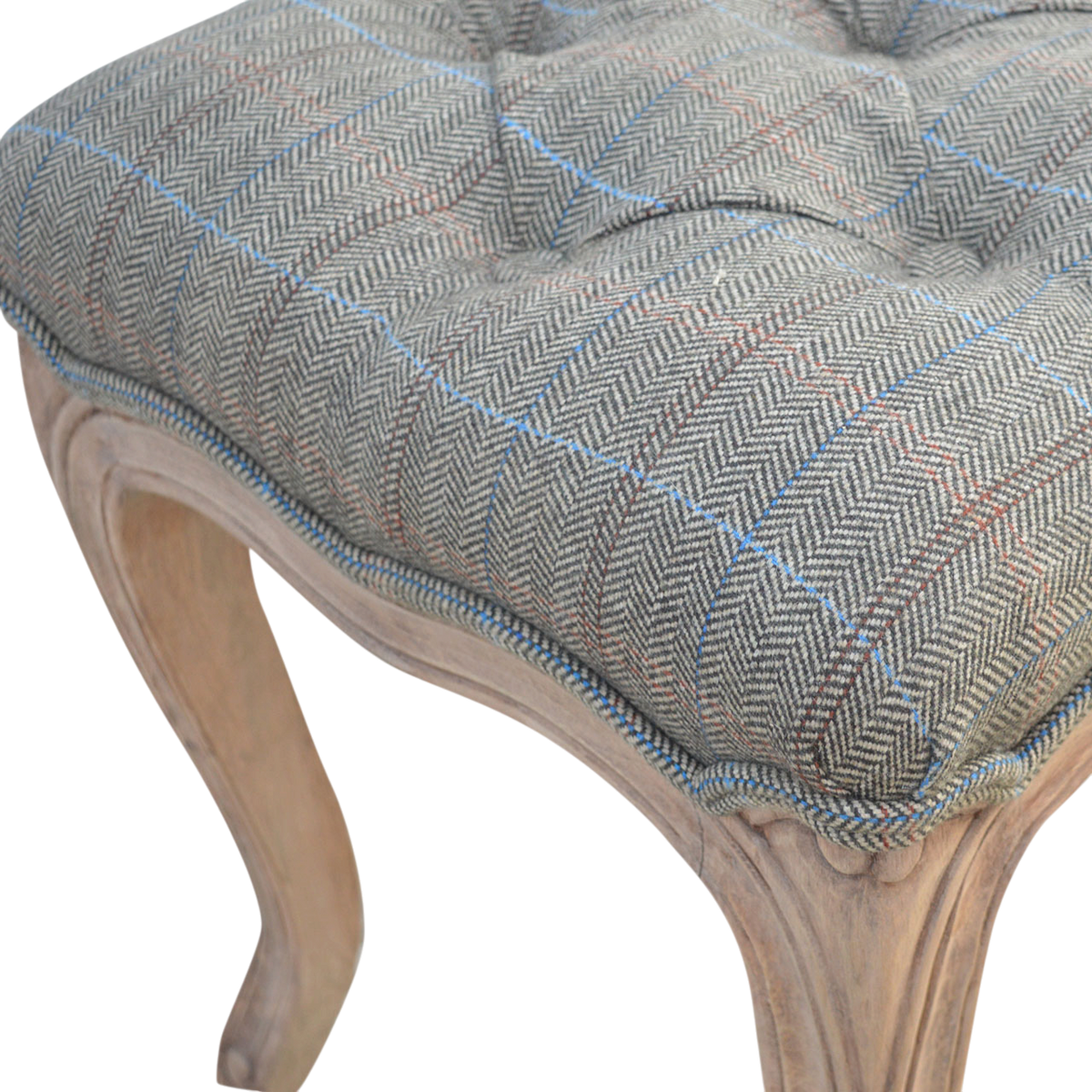 Close view of the buttoning on the Mirabel Carved Bench in Heritage Tweed.