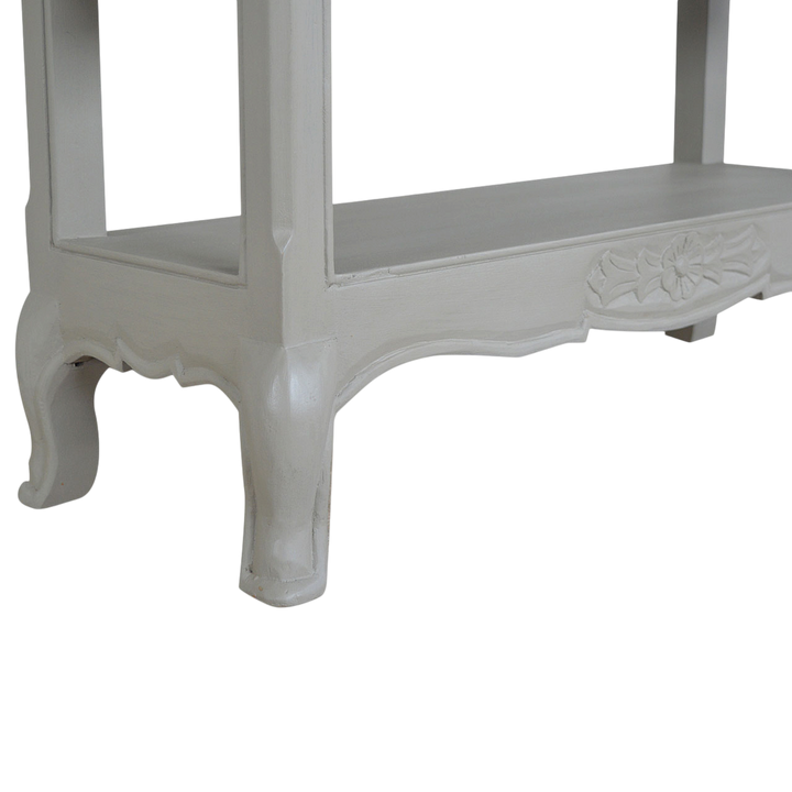 Close view of the legs on the Mirabel Painted Console Table in Amber with Stone.