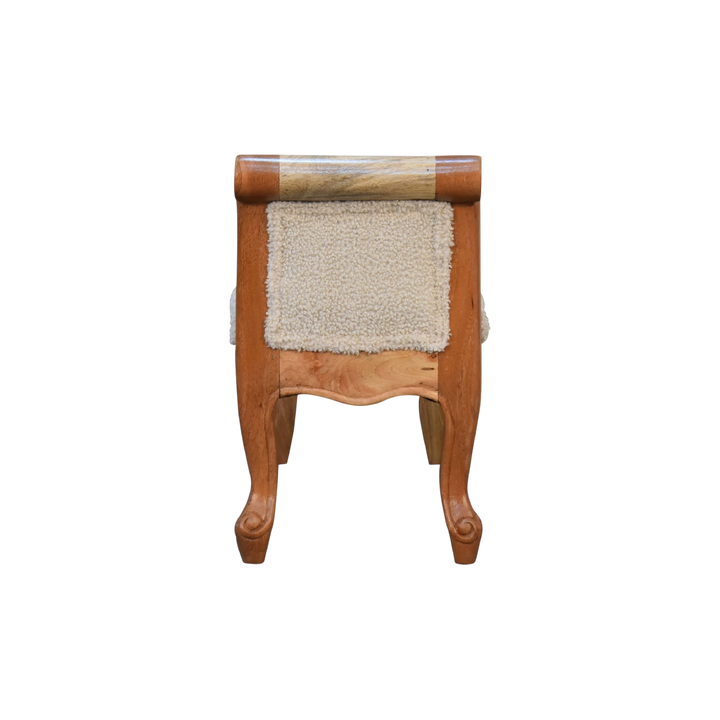 Mirabel Scroll-Arm Bench in Cream Bouclé, side view showing the depth.