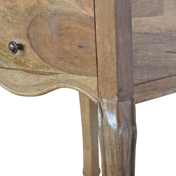 Close view of the legs on the Mirabel Tall 2-Drawer Bedside Table in Amber.