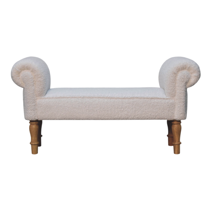 Oakhurst Bedroom Bench in Alabaster Bouclé, front view. Alabaster bouclé in cotton and natural yarn over a 100% solid hardwood frame, turned legs in a pale amber finish.