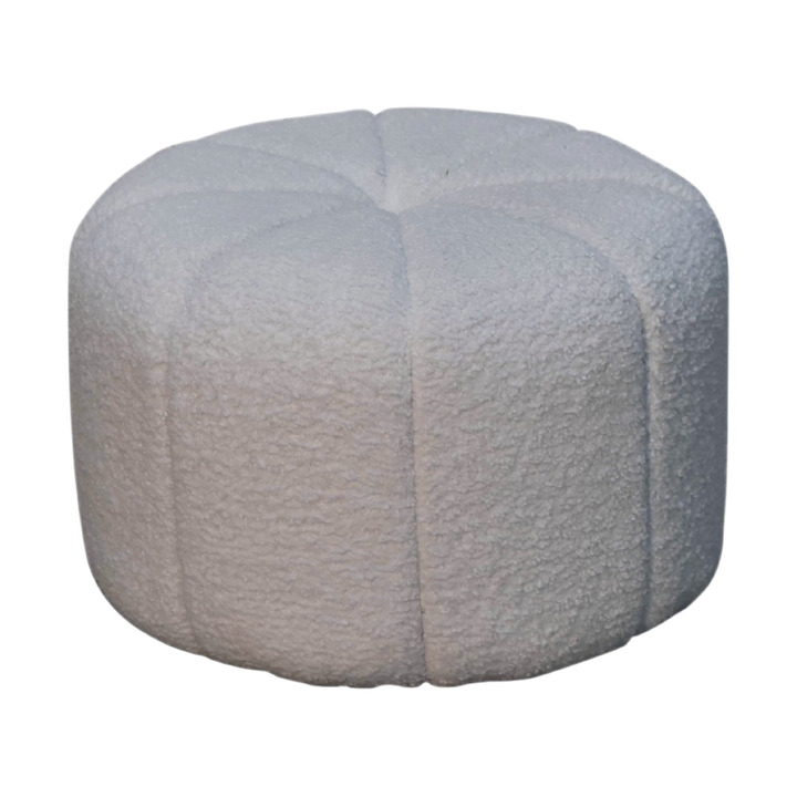 Oakhurst Drum Footstool in Alabaster Bouclé, three-quarter view showing the full profile.