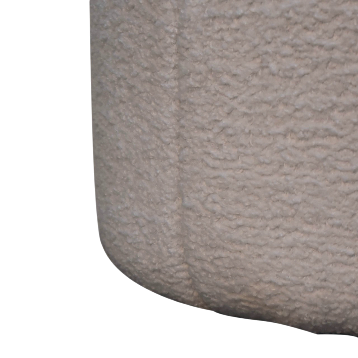 Close view of the seat on the Oakhurst Drum Footstool in Alabaster Bouclé.