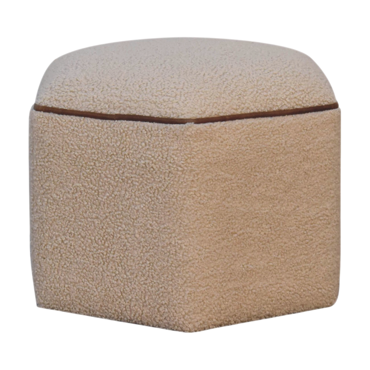 Oakhurst Hexagonal Footstool in Cream Bouclé with Tobacco Piping, three-quarter view showing the full profile.
