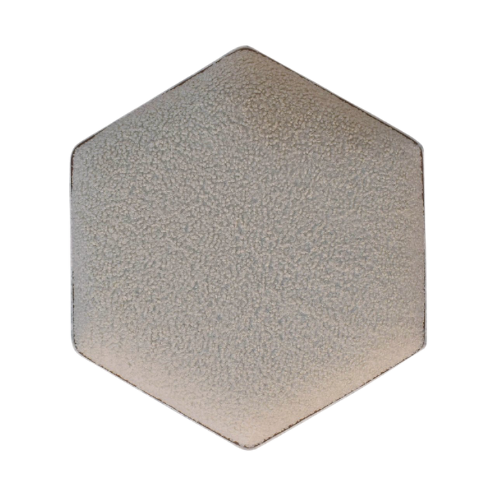 Oakhurst Hexagonal Footstool in Cream Bouclé with Tobacco Piping, shown from above.