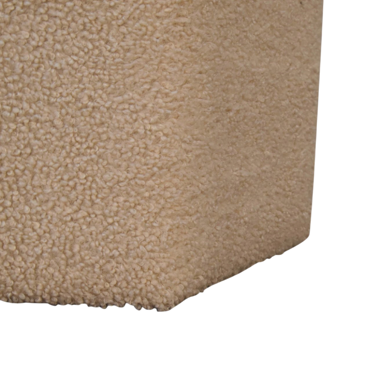 Close view of the bouclé on the Oakhurst Hexagonal Footstool in Cream Bouclé with Tobacco Piping.