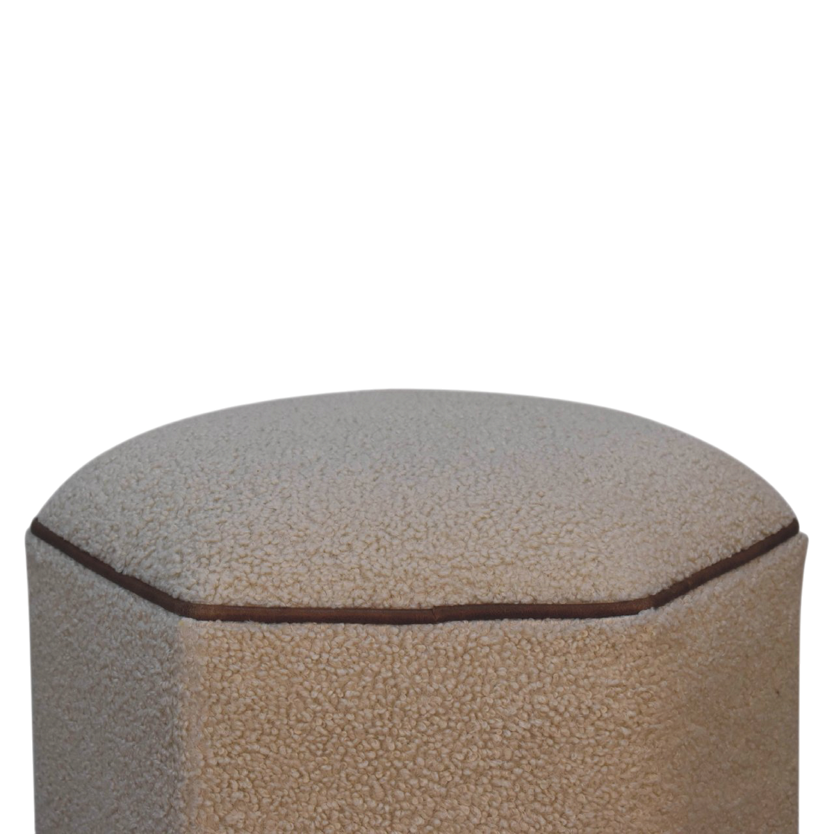 Close view of the seat on the Oakhurst Hexagonal Footstool in Cream Bouclé with Tobacco Piping.