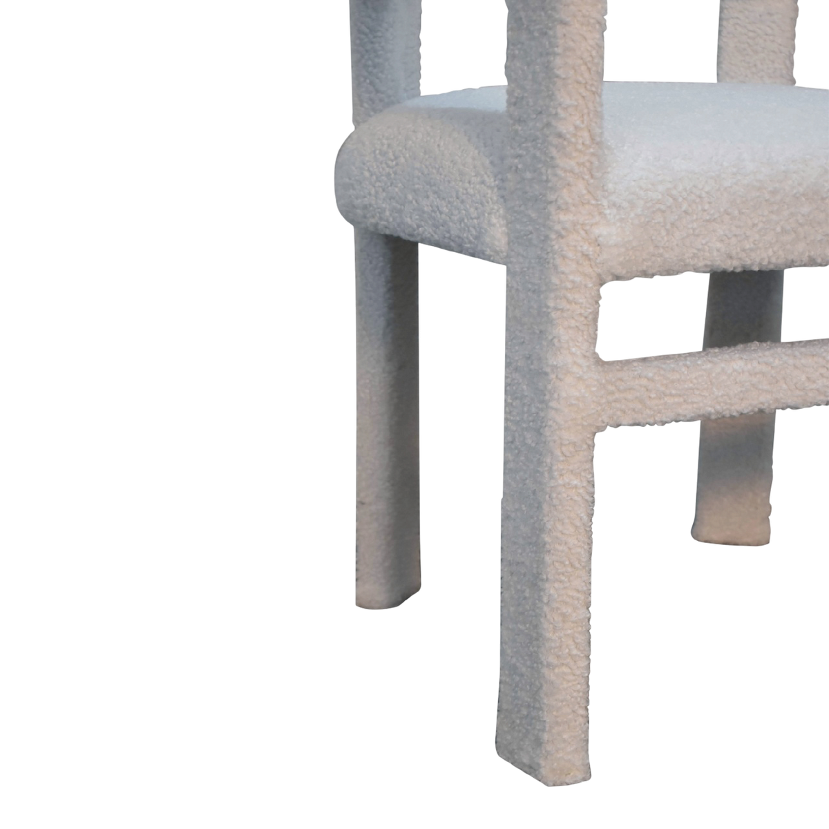 Close view of the legs on the Oakhurst Occasional Chair in Alabaster Bouclé.