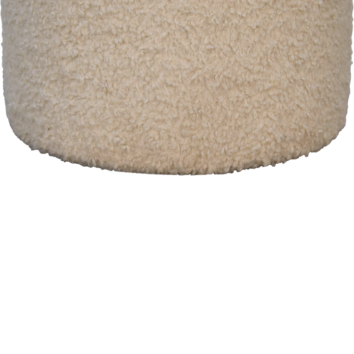 Close view of the bouclé on the Oakhurst Round Footstool in Cream Bouclé.