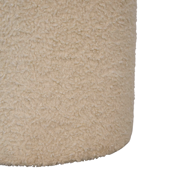 Close view of the edge on the Oakhurst Round Footstool in Cream Bouclé.