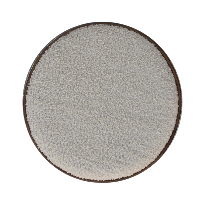 Oakhurst Round Footstool in Cream Bouclé with Tobacco Piping, shown from above.