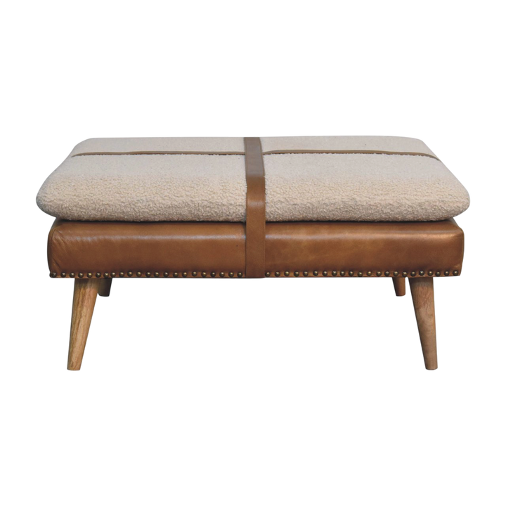 Oakhurst Square Footstool in Cream Bouclé with Tobacco Leather, front view. Cream bouclé in cotton and natural yarn over a 100% solid hardwood frame, tobacco leather belted straps.