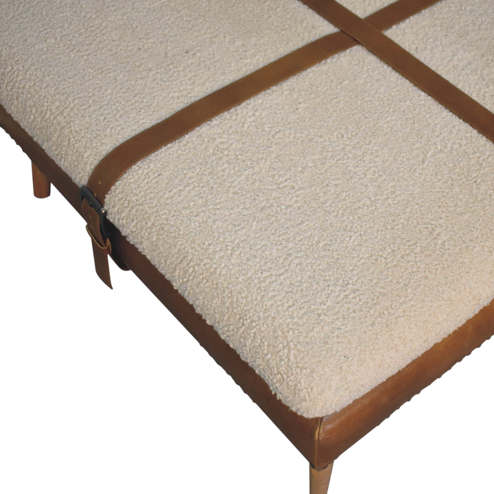 Close view of the stud trim on the Oakhurst Square Footstool in Cream Bouclé with Tobacco Leather.
