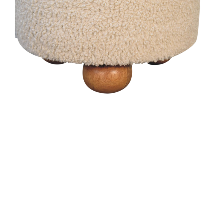 Close view of the feet on the Oakhurst Storage Footstool in Cream Bouclé.