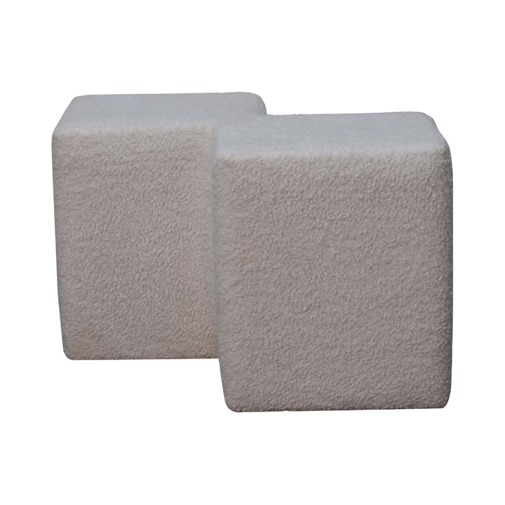 Oakhurst Twin Footstool in Alabaster Bouclé, front view. Alabaster bouclé in cotton and natural yarn over a solid hardwood frame, twin-lobed body, fully upholstered.