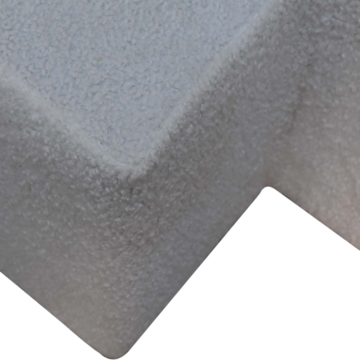 Close view of the bouclé on the Oakhurst Twin Footstool in Alabaster Bouclé.