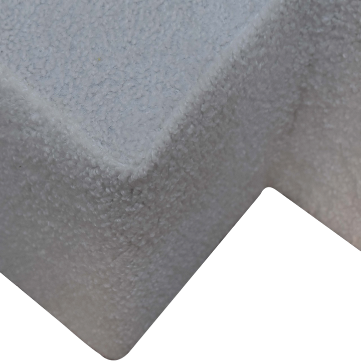 Close view of the bouclé on the Oakhurst Twin Footstool in Alabaster Bouclé.