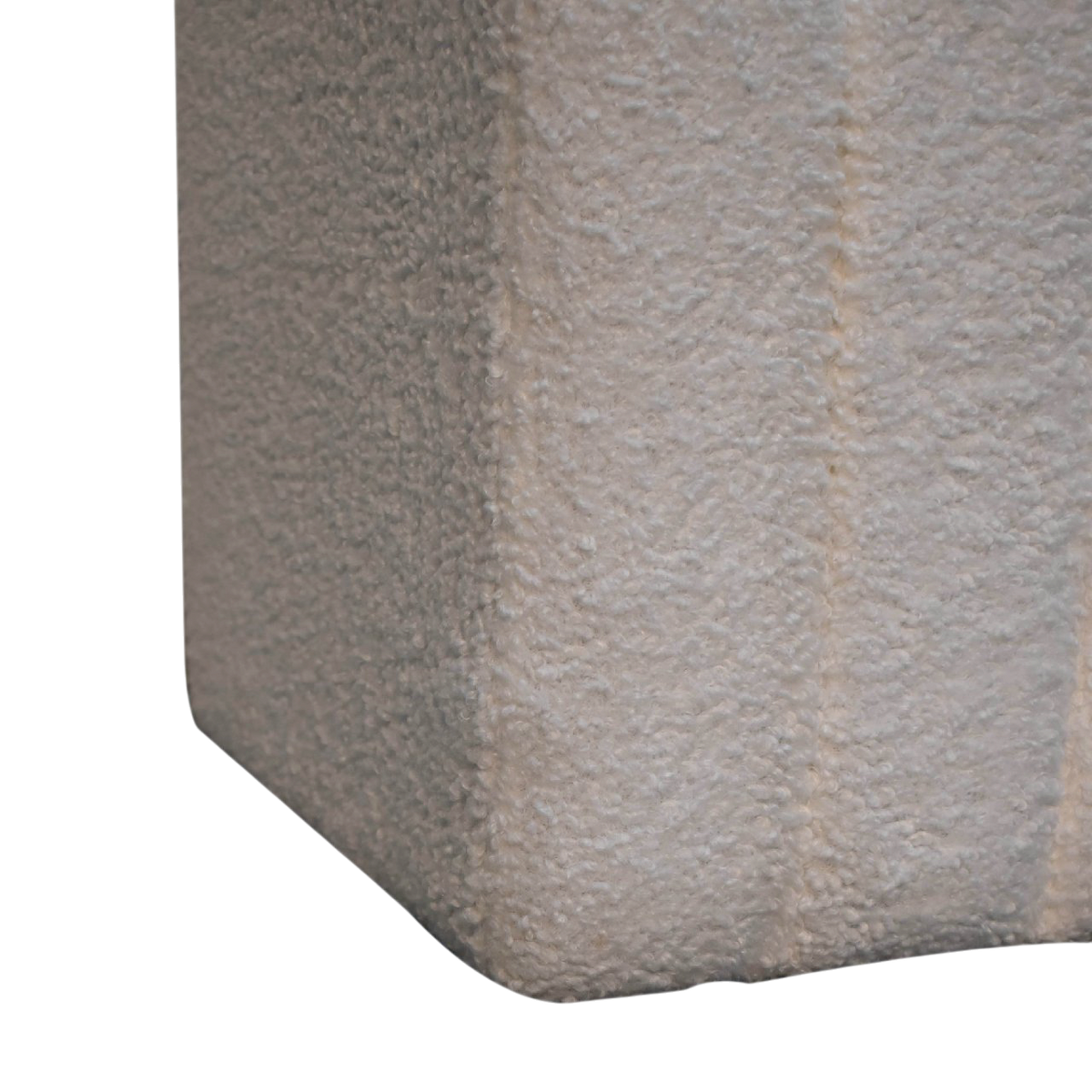 Close view of the bouclé on the Oakhurst Wave Footstool in Alabaster Bouclé.