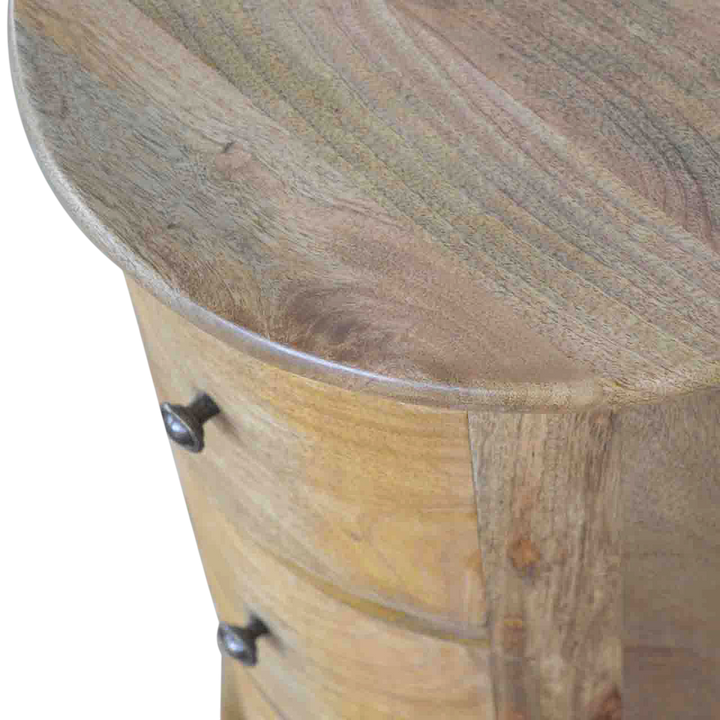 Close view of the top on the Odense 3-Drawer Drum Chest in Amber.