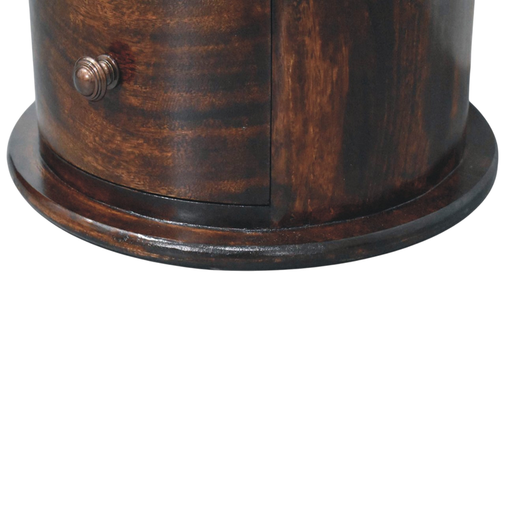 Close view of the base on the Odense 3-Drawer Drum Chest in Espresso.