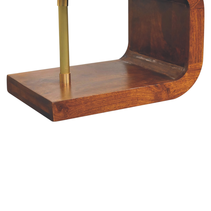 Close view of the base on the Odense Brass-Bar Bedside Table in Chestnut.