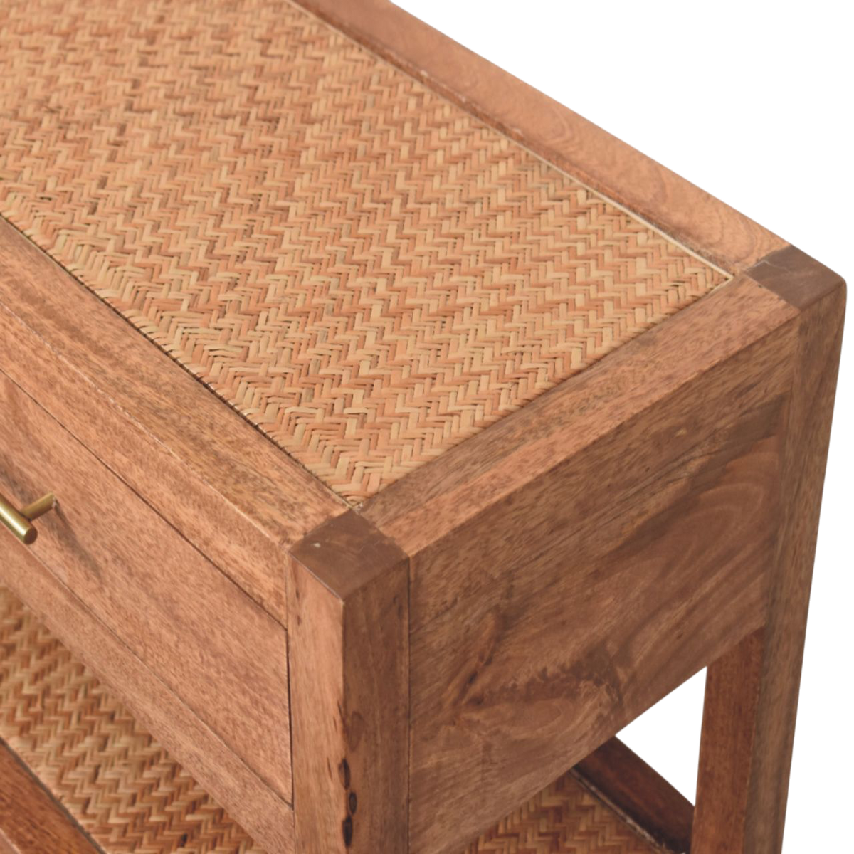 Close view of the rattan wrap on the base on the Odense Cane Console in Amber.