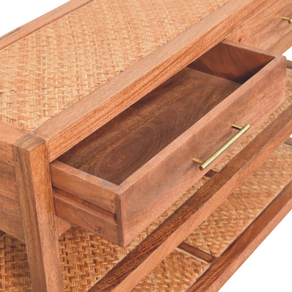 Odense Cane Console in Amber, shown with a drawer open.