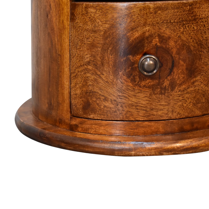 Close view of the base on the Odense Mini 3-Drawer Drum Chest in Chestnut.
