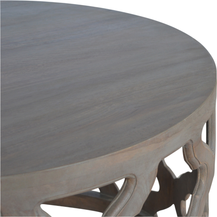 Palladio Carved Stool in Stone, shown from above.