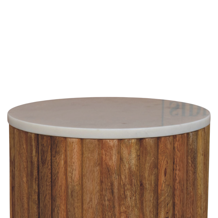 Close view of the top on the Palladio Round Marble Side Table in Amber.