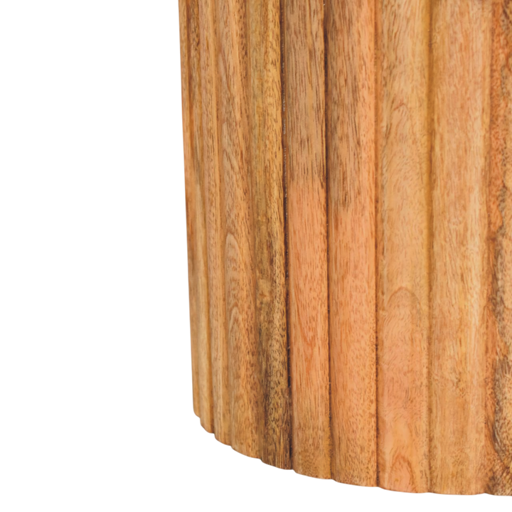 Close view of the base on the Palladio Round Marble Side Table in Amber.