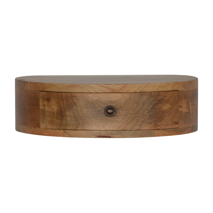 Pimlico Rounded Wall-Mounted Bedside Table in Amber, front view. 100% solid hardwood in a warm amber finish, one drawer, rounded corners, wall-hung with no legs.