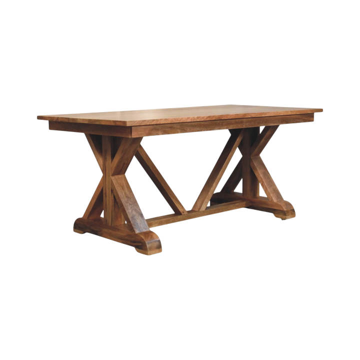 Refectory Trestle Table in Amber, three-quarter view showing the full profile.