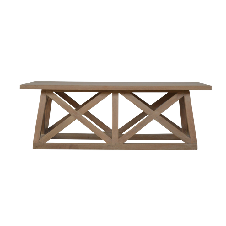 Saltire Coffee Table in Driftwood, front view. Rectangular top over a cross-braced wood base.