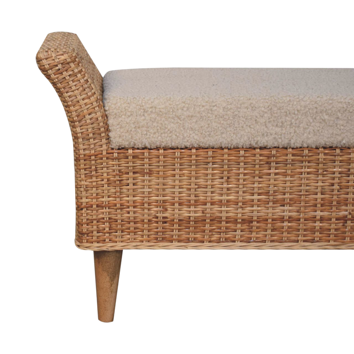 Close view of the rolled arm and upholstery on the Serafina Scroll-Arm Bench in Rattan and Cream Bouclé.