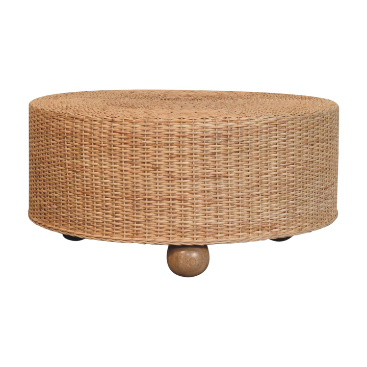 Serafina Woven Drum Table with Ball Feet, front view. Handwoven exterior on rounded ball feet.