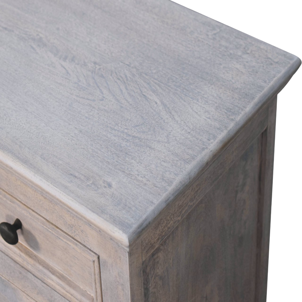 Close view of the grain on the tabletop on the Sigtuna Glazed Cabinet in Stone.