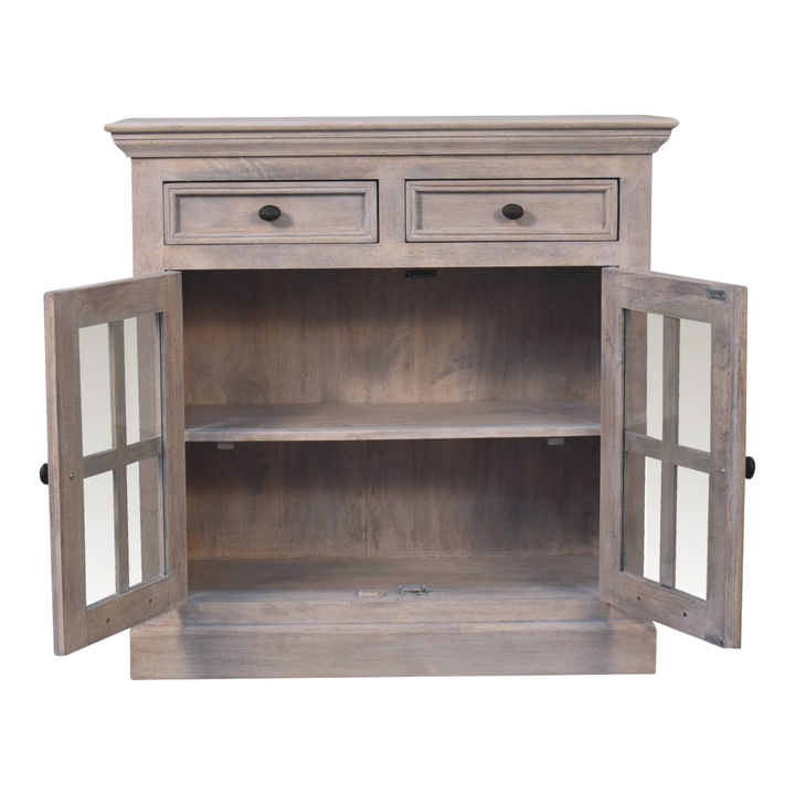 Sigtuna Glazed Cabinet in Stone, shown with the doors open, revealing the interior shelving.