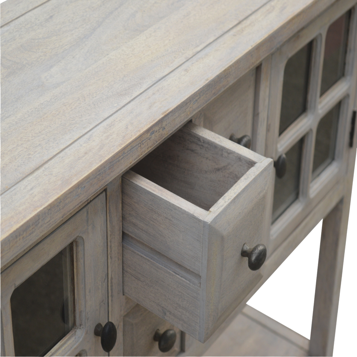 Sigtuna Glazed Console Table in Stone, shown with a drawer open.